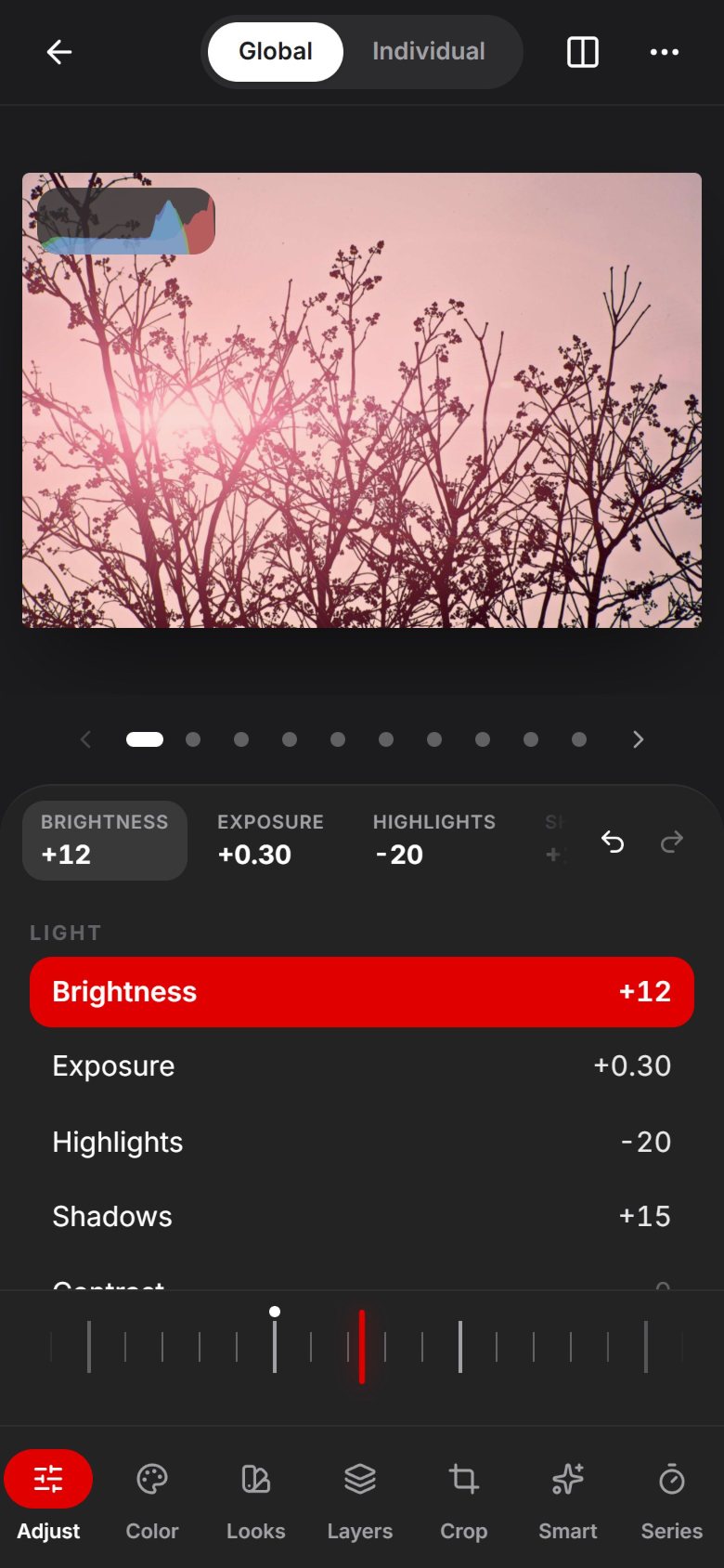Jumpman’s editor in Global mode: the summary bar shows Brightness +12, Exposure +0.30 and Highlights −20 above the red Brightness row and the dial.